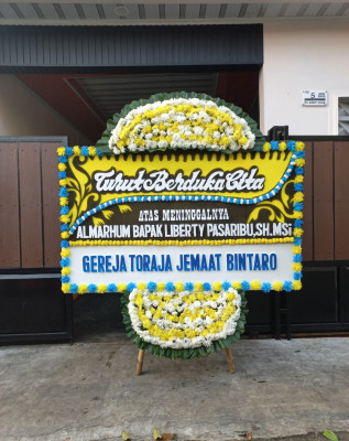 Papan Bunga Duka di Paguyaman